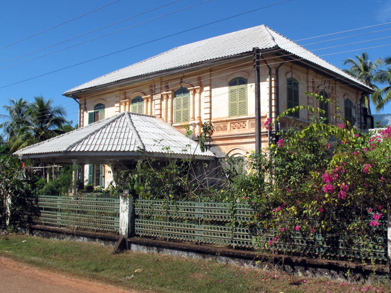 Run-down old shophouse in Champasak