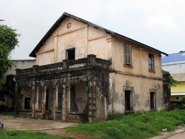 A stately old house, still in use although unkempt